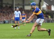 10 July 2016; John McGrath of Tipperary shoots to score his side's fourth goal, from a penalty, during the Munster GAA Hurling Senior Championship Final match between Tipperary and Waterford at the Gaelic Grounds in Limerick.  Photo by Stephen McCarthy/Sportsfile