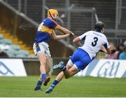 10 July 2016; Seamus Callanan of Tipperary scoring his side's fifth goal despite the efforts of Barry Coughlan of Waterford during the Munster GAA Hurling Senior Championship Final match between Tipperary and Waterford at the Gaelic Grounds in Limerick. Photo by Eóin Noonan/Sportsfile