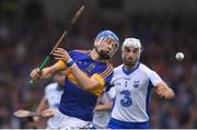 10 July 2016; John McGrath of Tipperary in action against Shane Fives of Waterford during the Munster GAA Hurling Senior Championship Final match between Tipperary and Waterford at the Gaelic Grounds in Limerick.  Photo by Stephen McCarthy/Sportsfile