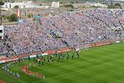22 August 2010; The Cork and Dublin teams march behind the St Michael's Scout Band, Enniskillen, during the pre-match parade before the game. GAA Football All-Ireland Senior Championship Semi-Final, Dublin v Cork, Croke Park, Dublin. Picture credit: Brendan Moran / SPORTSFILE
