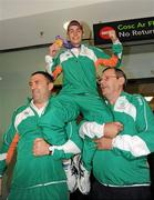 27 August 2010; Youth Olympics Gold Medallist Ryan Burnett, Holy Family Boxing Club, Belfast, arrives back to Ireland after winner gold in the Light Fly weight, 48kg, category. Dublin Airport, Dublin. Photo by Sportsfile