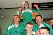 27 August 2010; Youth Olympics Gold Medallist Ryan Burnett, Holy Family Boxing Club, Belfast, arrives back to Ireland after winner gold in the Light Fly weight, 48kg, category. Dublin Airport, Dublin. Photo by Sportsfile