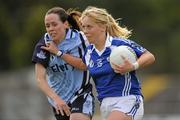 28 August 2010; Martina Dunne, Laois, in action against Avril Cluxton, Dublin. TG4 Ladies Football All-Ireland Senior Championship Semi-Final, Dublin v Laois, Dr. Cullen Park, Carlow. Picture credit: Brendan Moran / SPORTSFILE