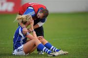 28 August 2010; Aishling Quigley, Laois, is consoled by her team manager Joe Higgins after the final whistle. TG4 Ladies Football All-Ireland Senior Championship Semi-Final, Dublin v Laois, Dr. Cullen Park, Carlow. Picture credit: Brendan Moran / SPORTSFILE