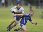 28 August 2010; Mark Loughran, Errigal Ciaran, in action against Philip Toner, Coalisland. Target Express Tyrone Senior Football Championship Quarter Final, Coalisland v Errigal Ciaran, O'Neill Park, Dungannon, Co. Tyrone. Picture credit: Oliver McVeigh / SPORTSFILE