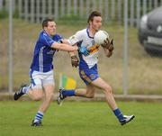 28 August 2010; Ciaran McGinley, Errigal Ciaran, in action against Steven McNally, Coalisland. Target Express Tyrone Senior Football Championship Quarter Final, Coalisland v Errigal Ciaran, O'Neill Park, Dungannon, Co. Tyrone. Picture credit: Oliver McVeigh / SPORTSFILE