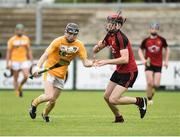 10 July 2016; Conal Doherty Cunning of Antrim in action against Patrick Branagan of Down during the Electric Ireland Ulster GAA Hurling Minor Championship Final match between Antrim and Down at Derry GAA Centre of Excellence in Owenbeg, Derry. Photo by Oliver McVeigh/Sportsfile