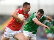 9 July 2016; Paul Kerrigan of Cork in action against Stephen Cahill of Limerick during the GAA Football All-Ireland Senior Championship Round 2A match between Limerick and Cork at Semple Stadium in Thurles, Tipperary. Photo by Stephen McCarthy/Sportsfile