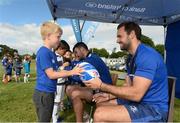 13 July 2016; Leinster's Niall Morris signs an autograph for Simon Daniel during the Bank of Ireland Leinster Rugby Summer Camp - Greystones RFC at Greystones RFC in Greystones, Co Wicklow. Photo by Matt Browne/Sportsfile