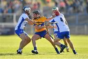 13 July 2016; Shane Gleeson of Clare in action against Waterford players, from left, Míchéal Harney, Darragh Lyons and Mark O'Brien during the Bord Gáis Energy Munster U21 Hurling Championship Semi-Final match between Waterford and Clare at Walsh Park in Waterford. Photo by Stephen McCarthy/Sportsfile