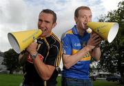 25 August 2010; Hurling rivals from Kilkenny and Tipperary go head to head to launch the Aviva ‘Have You Got Balls Challenge’. Along with Aviva, All Ireland Hurlers, Lar Corbett from Tipperary and Kilkenny’s Eddie Brennan, are challenging men to put their sports balls to the test against the sports stars while raising money for the Irish Heart Foundation. Kilkenny hurler Eddie Brennan, left, and Tipperary hurler Lar Corbett are pictured at the launch of Aviva Health Insurance Benefit with Fit Squad. Durrow, Co. Laois. Picture credit: Brian Lawless / SPORTSFILE