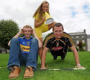 25 August 2010; Hurling rivals from Kilkenny and Tipperary go head to head to launch the Aviva ‘Have You Got Balls Challenge’. Along with Aviva, All Ireland Hurlers, Lar Corbett from Tipperary and Kilkenny’s Eddie Brennan, are challenging men to put their sports balls to the test against the sports stars while raising money for the Irish Heart Foundation. Tipperary hurler Lar Corbett, left, and Kilkenny hurler Eddie Brennan are pictured with Fitsquad trainer Kate Ryan at the launch of Aviva Health Insurance Benefit with Fit Squad. Durrow, Co. Laois. Picture credit: Brian Lawless / SPORTSFILE