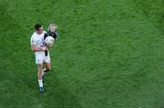 29 August 2010; Kildare's Aindriú Mac Lochlainn leaves the pitch after the game with his daughter Ella May after the game. GAA Football All-Ireland Senior Championship Semi-Final, Kildare v Down, Croke Park, Dublin. Picture credit: Brendan Moran / SPORTSFILE