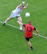29 August 2010; Benny Coulter, 13, Down, kicks a point with the outside of his right boot during the first half despite the best efforts of Morgan O'Flaherty, Kildare. GAA Football All-Ireland Senior Championship Semi-Final, Kildare v Down, Croke Park, Dublin. Picture credit: Brendan Moran / SPORTSFILE