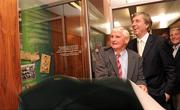 30 August 2010; Former professional footballer and the first manager of the Irish national football team Mick Meagan, unveils a Tribute Gallery in his honour alongside FAI Chief Executive John Delaney. FAI Headquarters, Abbottstown, Dublin. Photo by Sportsfile