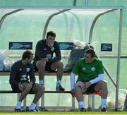 30 August 2010; Republic of Ireland players left to right, Aiden McGeady, Keith Treacy and Richard Dunne, sit in the dug out during squad training ahead of their EURO 2012 Championship Group B Qualifier against Armenia on Friday. Republic of Ireland squad training, Gannon Park, Malahide, Dublin. Picture credit: David Maher / SPORTSFILE