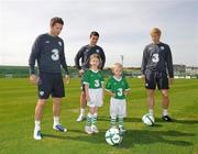 31 August 2010; Nathan Howard, age 4, and his sister Alex, age 7, from Ashbourne, Co. Meath, with Republic of Ireland players Robbie Keane, Shane Long and Paul McShane at the announcement today by 3, Ireland’s largest high speed network, and the Football Association of Ireland of an exciting opportunity for one lucky young football fan to be the next mascot when the senior National team play Andorra in the Aviva Stadium on September 7th 2010. The winner will have the chance of a lifetime to lead the team onto the pitch with the captain, Robbie Keane. All entrants must be 7-11 years old. To nominate a mascot, visit www.three.ie and submit 50 words on why your nominated child would make a great mascot for the Irish National football team. The winner will be announced after the team training session on Monday 6th September and the prize will also include overnight accommodation and a new 3Pay phone from 3 for the nominator. Gannon Park, Malahide, Co. Dublin. Picture credit: David Maher / SPORTSFILE