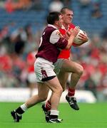 22 July 2001; Brendan Jer O'Sullivan of Cork in action against Tommy Joyce of Galway during the Bank of Ireland All-Ireland Senior Football Championship Qualifier, round 4, match between Galway and Cork at Croke Park in Dublin. Photo by Brendan Moran/Sportsfile