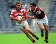 22 July 2001; Kevin O'Dwyer of Cork in action against Alan Kerins of Galway during the Bank of Ireland All-Ireland Senior Football Championship Qualifier, round 4, match between Galway and Cork at Croke Park in Dublin. Photo by Brendan Moran/Sportsfile