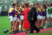 1 September 1996; President Mary Robinson and Guinness president Jack Boothman meets Wexford captain Martin Storey ahead of the Guinness All-Ireland Senior Hurling Championship Final match between Wexford and Limerick at Croke Park in Dublin. Photo by Ray McManus/Sportsfile