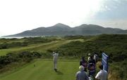 26 July 2001; Denis O'Sullivan watches his tee shot to the 4th green during Day 1 of the Senior British Open Golf Champonship at The Royal County Down Golf Club in Newcastle, Down. Photo by Matt Browne/Sportsfile