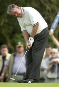 26 July 2001; John Bland watches his putt on the 14th green during Day 1 of the Senior British Open Golf Champonship at The Royal County Down Golf Club in Newcastle, Down. Photo by Matt Browne/Sportsfile
