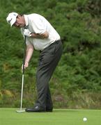 28 July 2001; Paul Leonard putts on the 5th green during Day 3 of the Senior British Open Golf Champonship at The Royal County Down Golf Club in Newcastle, Down. Photo by Matt Browne/Sportsfile