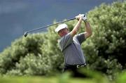 29 July 2001; Eddie Polland watches his drive from the 3rd tee box during Day 4 of the Senior British Open Golf Champonship at The Royal County Down Golf Club in Newcastle, Down. Photo by Matt Browne/Sportsfile