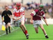 29 July 2001; Pauric Murphy of Derry in action against Adrian Callanan of Galway during the All-Ireland Minor Hurling Championship Quarter Final match between Galway and Derry at Croke Park in Dublin. Photo by Brian Lawless/Sportsfile