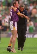29 July 2001; Wexford manager Tony Dempsey celebrates with Nicky Lambert following the Guinness All-Ireland Senior Hurling Championship Quarter-Final match between Wexford and Limerick at Croke Park in Dublin. Photo by Damien Eagers/Sportsfile