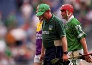 29 July 2001; Limerick Manager Eamonn Cregan walks off the pitch during the Guinness All-Ireland Senior Hurling Championship Quarter-Final match between Wexford and Limerick at Croke Park in Dublin. Photo by Damien Eagers/Sportsfile