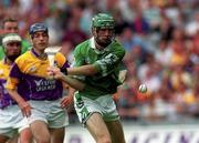 29 July 2001; Sean O'Connor of Limerick scores his sides third goal which was subsequently dissallowed  during the Guinness All-Ireland Senior Hurling Championship Quarter-Final match between Wexford and Limerick at Croke Park in Dublin. Photo by Damien Eagers/Sportsfile