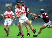 29 July 2001; Ryan Lynch of Derry in action against Kevin Broderick of Galway during the Guinness All-Ireland Senior hurling Championship Quarter-Final match between Galway and Derry at Croke Park in Dublin. Photo by Damien Eagers/Sportsfile