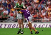 29 July 2001; Owen O'Neill of Limerick in action against Rory Mallon of Wexford during the Guinness All-Ireland Senior Hurling Championship Quarter-Final match between Wexford and Limerick at Croke Park in Dublin. Photo by Damien Eagers/Sportsfile