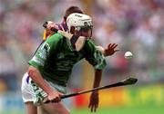 29 July 2001; Paul O'Grady of LImerick is tackled by Trevor Kelly of Wexford during the Guinness All-Ireland Senior Hurling Championship Quarter-Final match between Wexford and Limerick at Croke Park in Dublin. Photo by Damien Eagers/Sportsfile