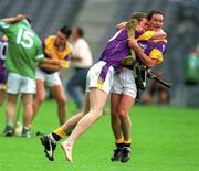 29 July 2001; Wexford players Nicky Lambert, left, and Adrian Fenlon celebrates victory over Limerick following the Guinness All-Ireland Senior Hurling Championship Quarter-Final match between Wexford and Limerick at Croke Park in Dublin. Photo by Damien Eagers/Sportsfile