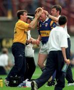 17 August 1997; Declan Ryan of Tipperary is attended to after receiving a head injury during the Guinness All-Ireland Senior Hurling Championship Semi-Final match between Tipperary and Wexford at Croke Park in Dublin. Photo by David Maher/Sportsfile