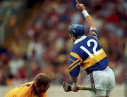 17 August 1997; John Leahy of Tipperary celebrates scoring his sides first goal as Wexford goalkeeper Damien Fitzhenry looks on during the Guinness All-Ireland Senior Hurling Championship Semi-Final match between Tipperary and Wexford at Croke Park in Dublin. Photo by David Maher/Sportsfile