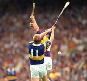 17 August 1997; Declan Ryan of Tipperary contests a high ball with Liam Dunne of Wexford during the Guinness All-Ireland Senior Hurling Championship Semi-Final match between Tipperary and Wexford at Croke Park in Dublin. Photo by David Maher/Sportsfile