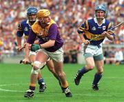 17 August 1997; Garry Laffan of Wexford during the Guinness All-Ireland Senior Hurling Championship Semi-Final match between Tipperary and Wexford at Croke Park in Dublin. Photo by David Maher/Sportsfile