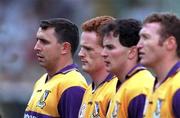 17 August 1997; Larry O'Gorman of Wexford, left, stands for the official team photograph during the Guinness All-Ireland Senior Hurling Championship Semi-Final match between Tipperary and Wexford at Croke Park in Dublin. Photo by David Maher/Sportsfile