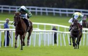 31 July 2001; Hardiman, with Paul Moloney up, races clear of Carina Bay, with John Cullen up, after clearing the last on their way to victory in the Albatros Plant Nutrition Steeplechase of £20,000 during day 2 of the Galway Summer Racing Festival at Ballybrit Racecourse in Galway. Photo by Damien Eagers/Sportsfile