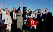 31 July 2001; Jockey Colm O'Donoghue celebrates with members of the Halfway House Syndicate after winning the McDonagh European Breeders Fund Handicap on Sheer Tenby during day 2 of the Galway Summer Racing Festival at Ballybrit Racecourse in Galway. Photo by Damien Eagers/Sportsfile