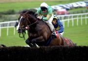 1 August 2001; Grimes, with Conor O'Dwyer up, clears the last ahead of Dovaly, Tom Rudd, on their way to winning the Compaq Galway Plate during day 3 of the Galway Summer Racing Festival at Ballybrit Racecourse in Galway. Photo by Damien Eagers/Sportsfile