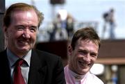 2 August 2001; Winning jockey Paul Carberry and winning trainer Dermot Weld after Ansar won the Guinness Galway Hurdle Handicap during day 4 of the Galway Summer Racing Festival at Ballybrit Racecourse in Galway. Photo by Damien Eagers/Sportsfile