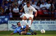 3 August 2001;  Stephen McPhail of Leeds United in action against Brendan Kelly of Dublin City during a pre-season friendly match between Dublin City and Leeds United at Tolka Park in Dublin Photo by David Maher/Sportsfile