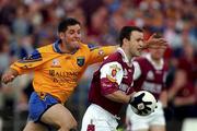 4 August 2001; Derek Savage of Galway is tackled by Francie Grehan of Roscommon during the Bank of Ireland All-Ireland Senior Football Championship Quarter Final match between Galway and Roscommon at Castlebar in Mayo. Photo by Matt Browne/Sportsfile
