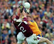 4 August 2001; Kieran Fitzgerald of Galway, 2, supported by team-mate Sean Og De Paor goes up for the ball against  Frankie Dolan of Roscommon during the Bank of Ireland All-Ireland Senior Football Championship Quarter Final match between Galway and Roscommon at Castlebar in Mayo. Photo by Matt Browne/Sportsfile