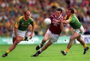5 August 2001;  Rory O'Connell of Westmeath in action against John McDermott, left, and Evan Kelly of Meath during the Bank of Ireland All-Ireland Senior Football Championship Quarter-Final match between Meath and Westmeath at Croke Park in Dublin. Photo by Aoife Rice/Sportsfile