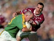 5 August 2001; Ollie Murphy of Meath in action against David O'Shaughnessy of Westmeath during the Bank of Ireland All-Ireland Senior Football Championship Quarter-Final match between Meath and Westmeath at Croke Park in Dublin. Photo by Aoife Rice/Sportsfile